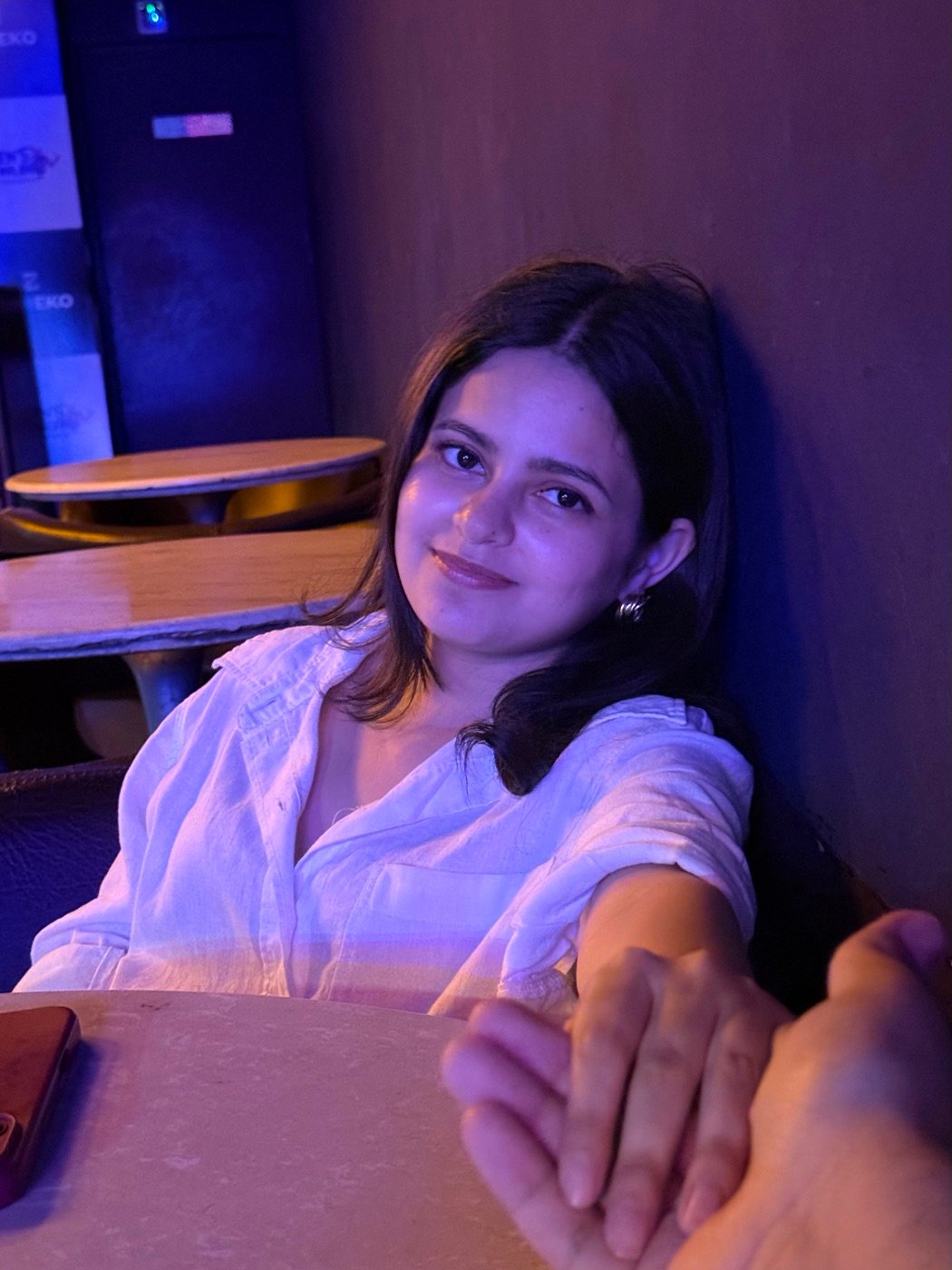 Ridhi reaching for my hand